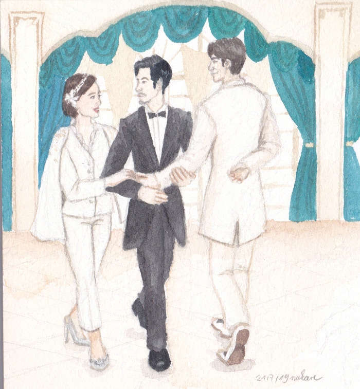 three people dancing together